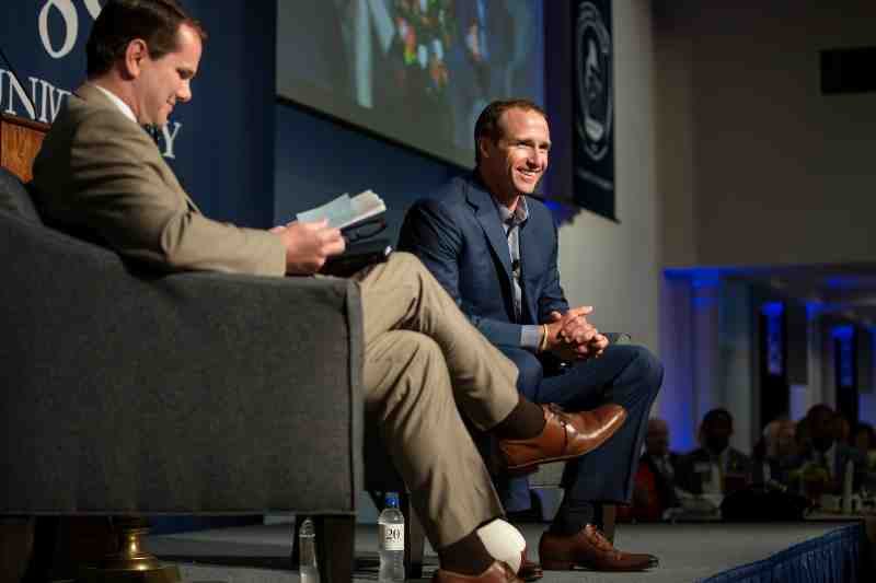 Drew Brees talks with Mississippi College President Dr. Blake Thompson at the 2019 Scholarship Dinner. 