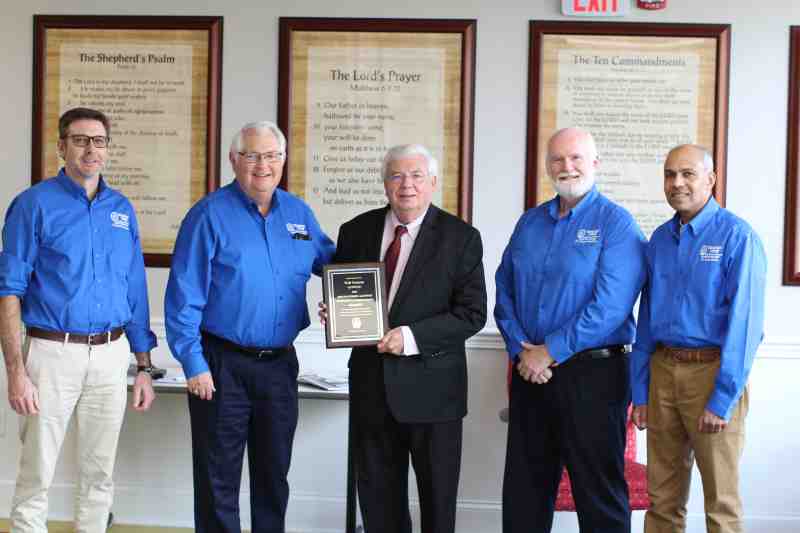 Walt Grayson, center, receives the 2021 Department of Christian Studies Distinguished Alumnus of the Year Award from Christian Studies faculty members, from left, Dr. David Champagne, Dr. Burn Page, Dr. Wayne VanHorn, and Dr. Ivan Parke.