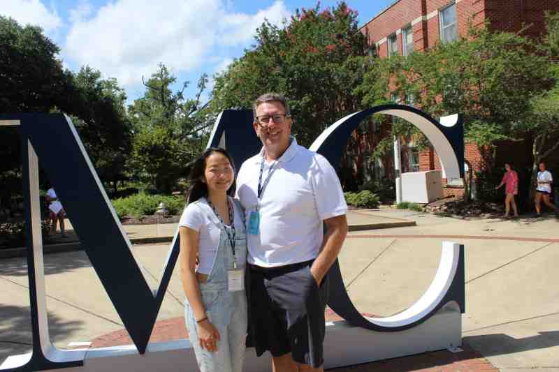 Mississippi College freshman Macy Parris joins her Dad, Ray Parris, on the Clinton campus as orientation winds down on July 12. A resident of Murrieta, California, Macy is a biology/pre-med major. Macy discovered MC online when searching America's Christian colleges. Macy believes the nation's 2nd oldest Baptist college is a place where she can 