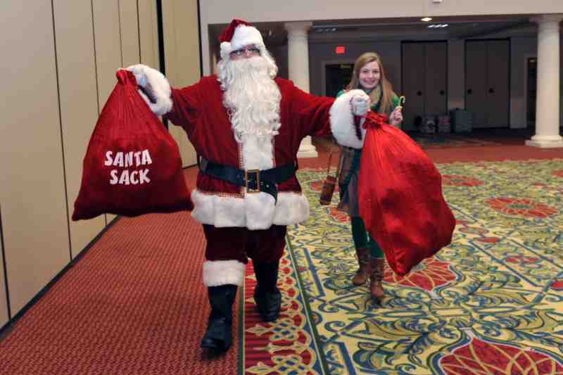 Santa Claus caps off Mississippi College's Christmas dinner welcome to Wingard Home kids. Photo by Barbara Gauntt