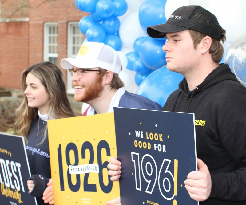 Students pose for pictures in a 'Selfie Booth' while celebrating Mississippi College's birthday during the 2022 Founders Day celebration on Pedestrian Street.