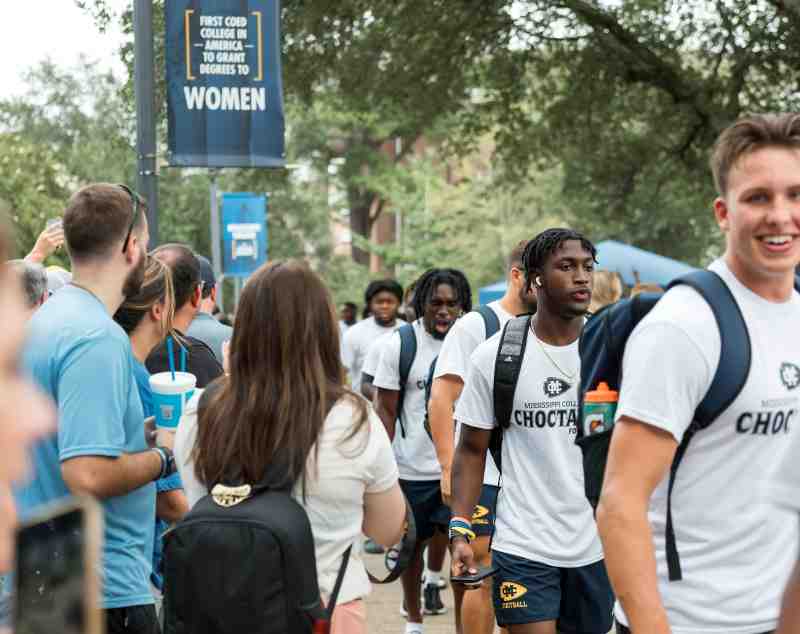 Faculty, staff, and students greet and cheer student-athletes during the Choctaw Walk, a Welcome Week tradition at Mississippi College.