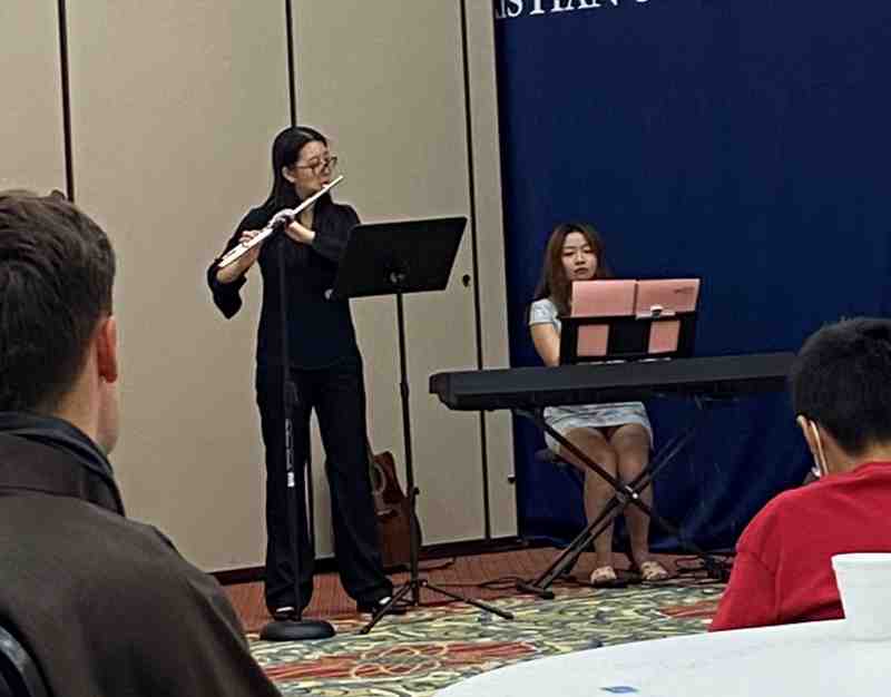 Guangyi Zou, left, and Yilin Xue, then-graduate students in the Mississippi College Department of Music, perform during the 2021 Moon Festival in Anderson Hall. This year, the event will move to Lions Club Park, weather permitting.