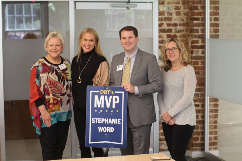 MC President Blake Thompson presents his DBT's MVP Award to Stephanie Word, second from left, mental health counselor, while Joy Gore Averitt, left, the September honoree, and Jenny Crutchfield, director of mental health services, observe.