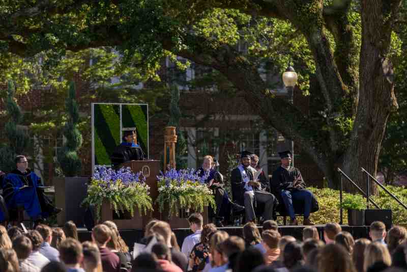 Kim Anthony, a four-time national champion on the UCLA gymnastics team, motivational speaker, and author at MC's commencement ceremony on the Quad.