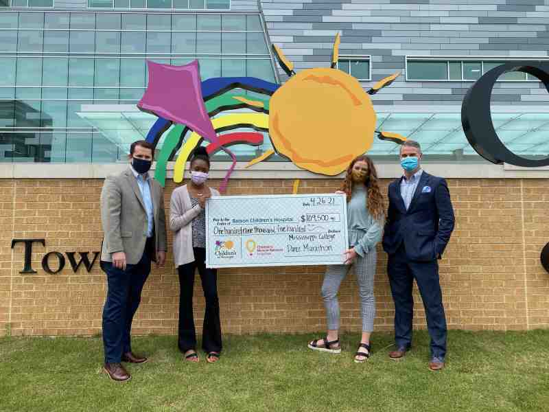 MC leaders, including President Blake Thompson and Jonathan Ambrose, join Dance Marathon student co-directors Camryn Johnson and Carley Fisher at UMMC.